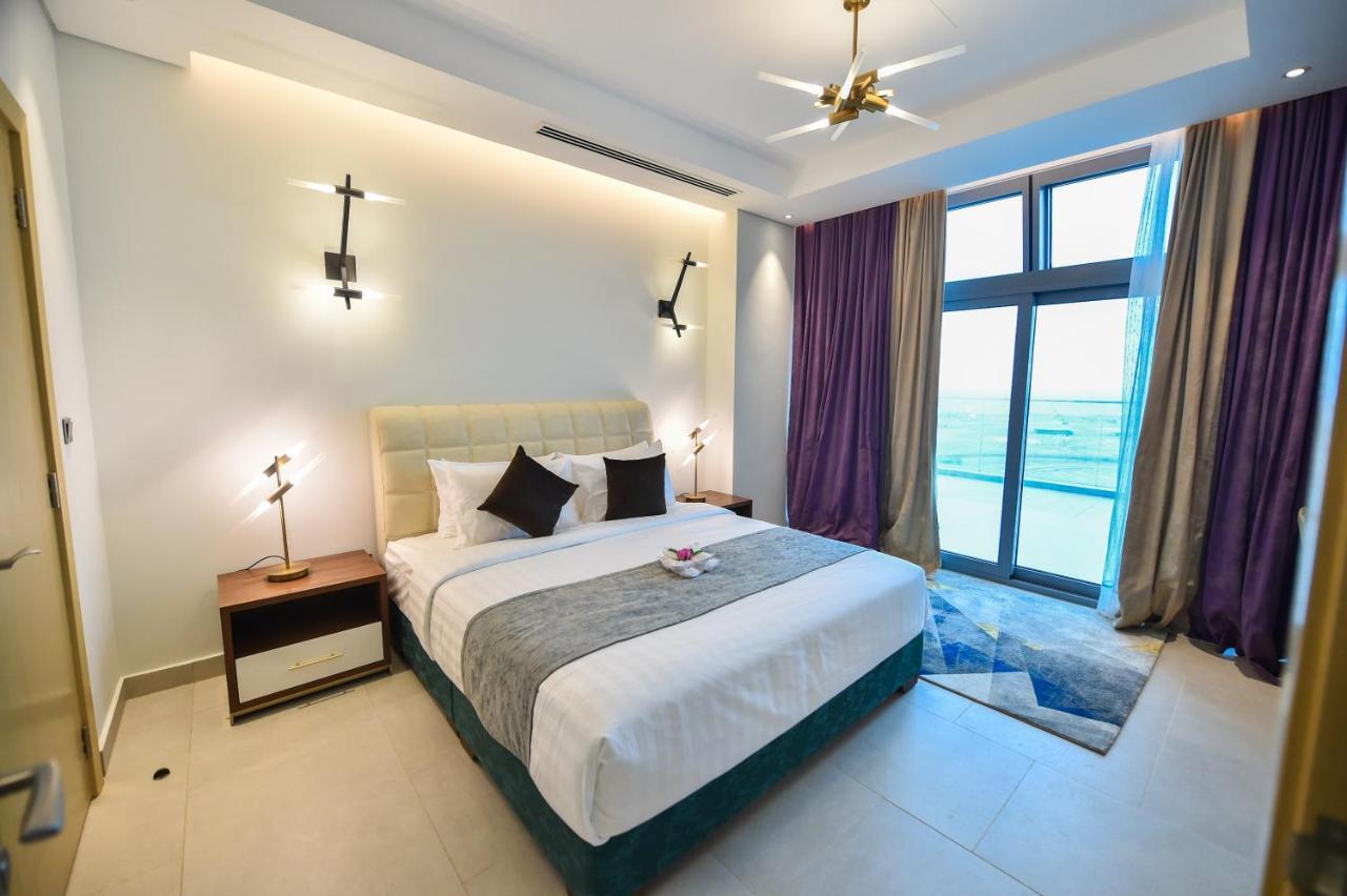 Waterfront Hotel Apartment Lusail Екстер'єр фото A bedroom at the hotel