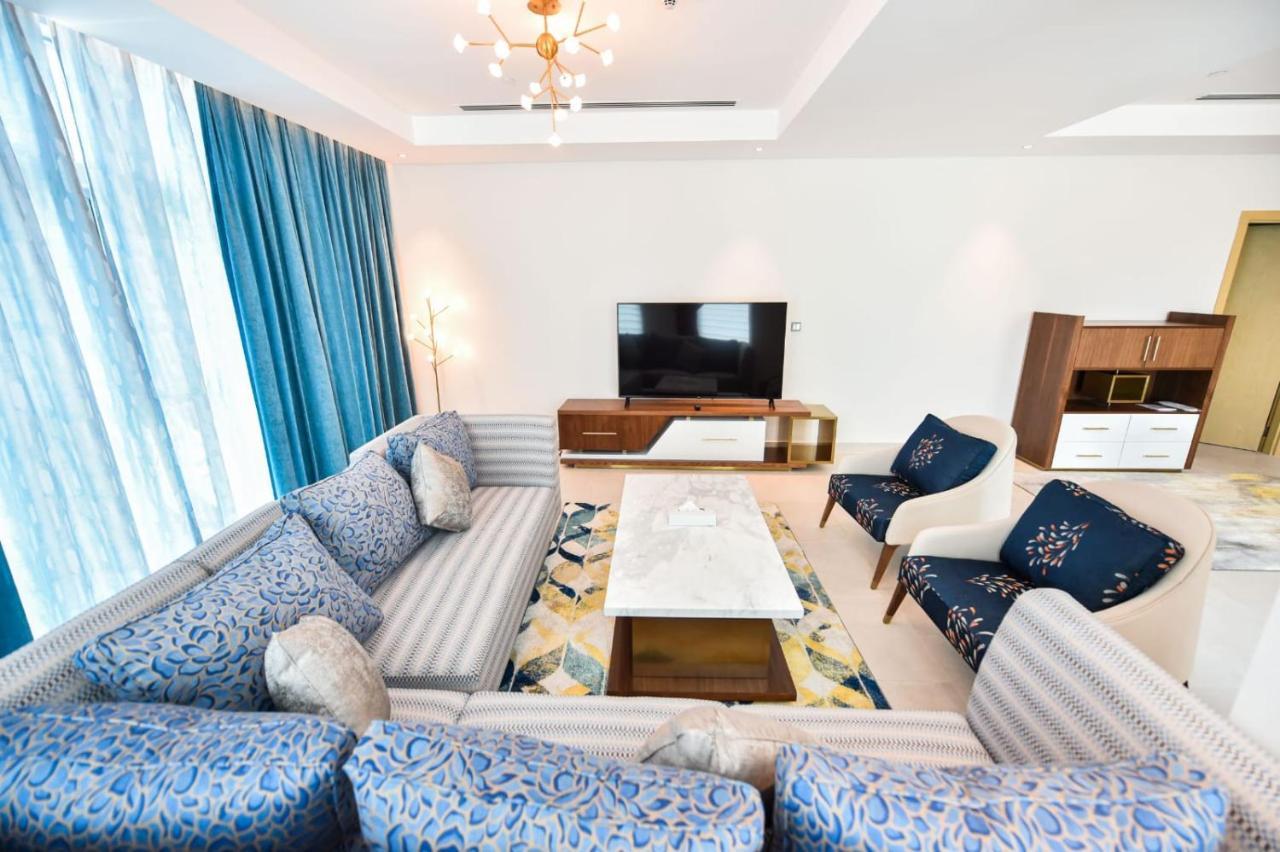 Waterfront Hotel Apartment Lusail Екстер'єр фото A living room in a luxury apartment