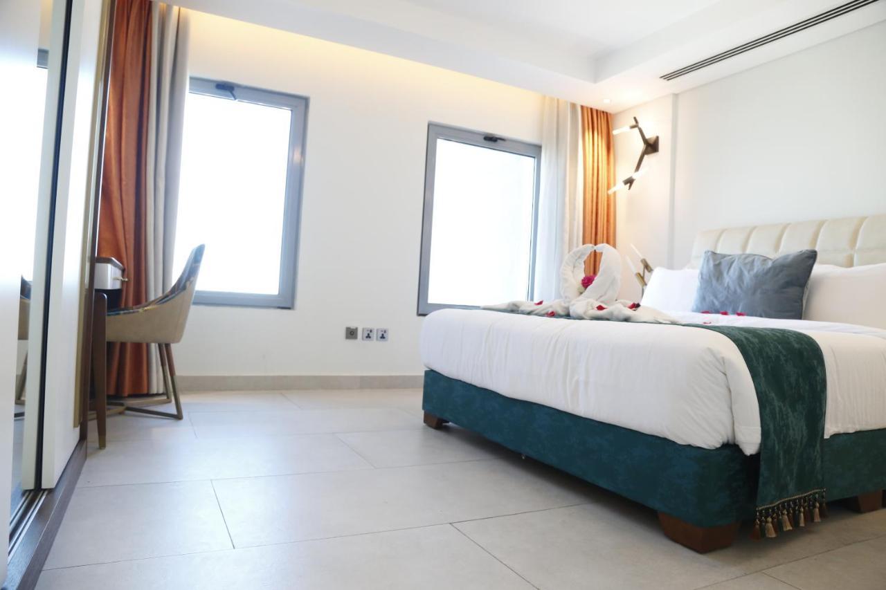 Waterfront Hotel Apartment Lusail Екстер'єр фото A room at the hotel